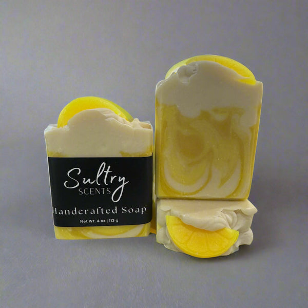 Sultry Scents lemon scented soap bar with vibrant yellow color and refreshing lemon design
