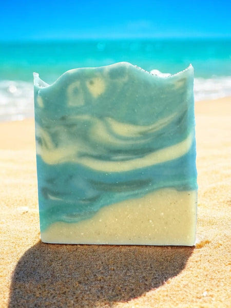 Luxury beach soap bar with a blue and white marbled design, perfect for a refreshing cleanse by the ocean