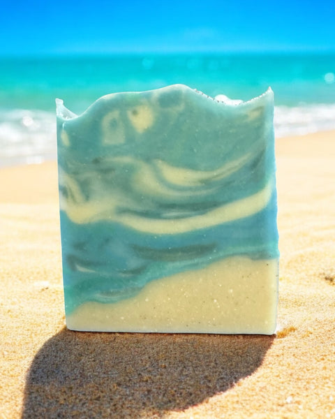 Luxury beach soap bar with a blue and white marbled design, perfect for a refreshing cleanse by the ocean