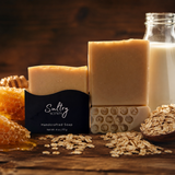 Natural Colloidal Oats Goat Milk Manuka Honey Soap from Sultry Scents displayed with honey and oats