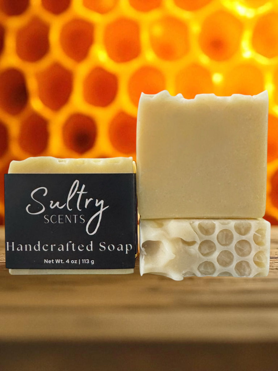 Sultry Scents handcrafted bar set on wood with honeycomb texture and natural Colloidal Oats goat milk Manuka honey soap