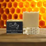 Sultry Scents handcrafted bar set on wood with honeycomb texture and natural Colloidal Oats goat milk Manuka honey soap