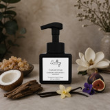 Sultry Scents Olibanum Inspired Foaming Hand Soap in a sleek pump bottle with floral and wood accents
