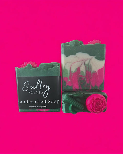Pear Jam inspired handcrafted soap by Sultry Scents with green and pink swirls and floral decoration