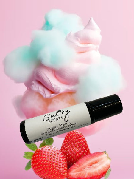 Sultry Scents Pink sugar dupe roll on perfume with strawberries and cotton candy background