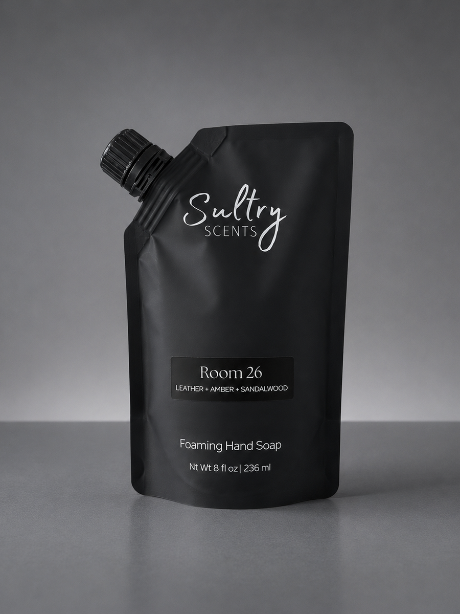 Room 26 foaming hand soap inspired by Santal 26 in a sleek black pouch for premium hand care