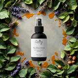 Black Sultry Scents Seduction body spray bottle on leaves lavender nuts and caramel drips seductive body spray inspired by Diva