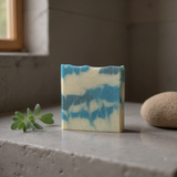Sultry Scents Soap inspired by Polo Sport with grit. Marbled blue and cream exfoliating bar on stone sink