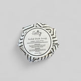 Sultry Scents solid dish soap lemon eucalyptus wrapped in black and white striped paper packaging