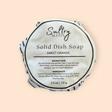 Sultry Scents solid dish soap in sweet orange scent with natural ingredients and usage instructions