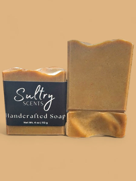Sultry Scents tallow turmeric soap two handcrafted bars wrapped and unwrapped in warm golden turmeric color
