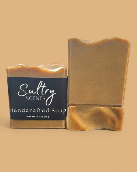 Sultry Scents tallow turmeric soap two handcrafted bars wrapped and unwrapped in warm golden turmeric color
