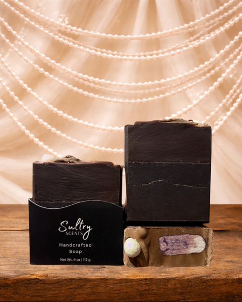 Sultry Scents handcrafted soap displayed on wooden surface with pearl backdrop, featuring vanilla skin inspired soap