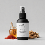 Sultry Scents Velvet Honey Santal inspired body spray in a sleek black bottle with honey, saffron, and wood scent notes pictured