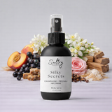 Sultry Scents Wedding Silk Santal dupe Body Spray in a sleek bottle with floral and fruity background