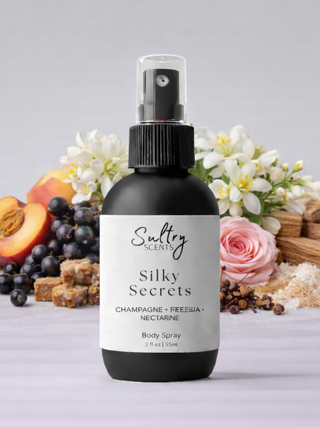 Sultry Scents Wedding Silk Santal dupe Body Spray in a sleek bottle with floral and fruity background