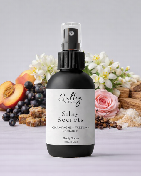 Sultry Scents Wedding Silk Santal dupe Body Spray in a sleek bottle with floral and fruity background