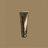 Sultry Scents ultra hydrating unscented body Cream in gold tube packaging on beige background