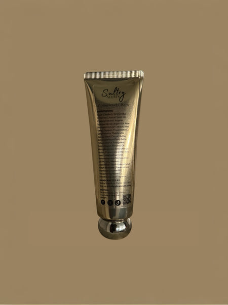 Sultry Scents ultra hydrating unscented body Cream in gold tube packaging on beige background