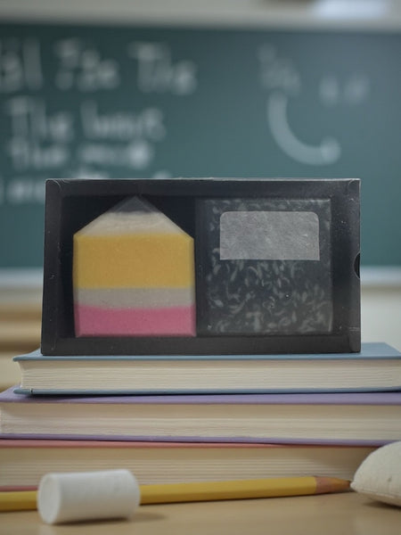 Teacher Gift Soap Set with colorful layers displayed on stacked books in a classroom setting