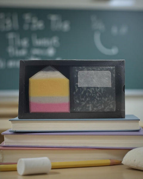 Teacher Gift Soap Set with colorful layers displayed on stacked books in a classroom setting