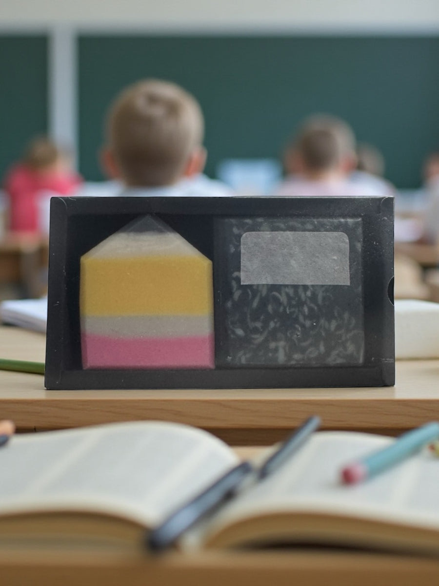 Teacher Gift Soap Set displayed on a classroom desk with students in the background