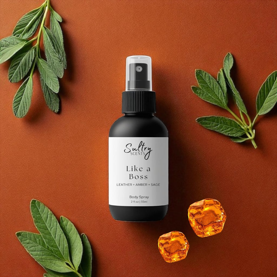 Sultry Scents Like a Boss body spray bottle on brown background with green leaves and amber cubes Tom Ford Fucking Fabulous dupe