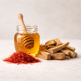 Scent notes for Velvet Honey Santal inspired body spray including honey, saffron, and sandalwood pieces