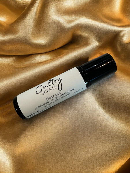 Sultry Scents Vetiver suede roll on perfume bottle on golden satin fabric background